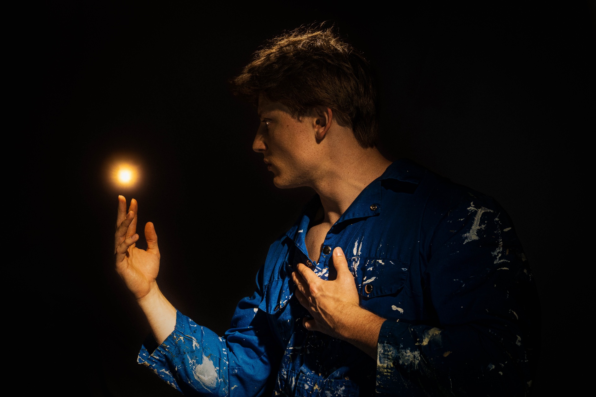 Max Kwiatkowski — portrait lit by a single warm point of light